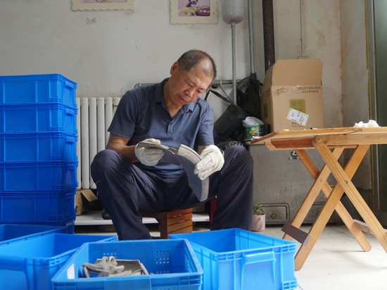 1661936409917136.jpg 禹州瓦店遗址整理拼对陶器.jpg